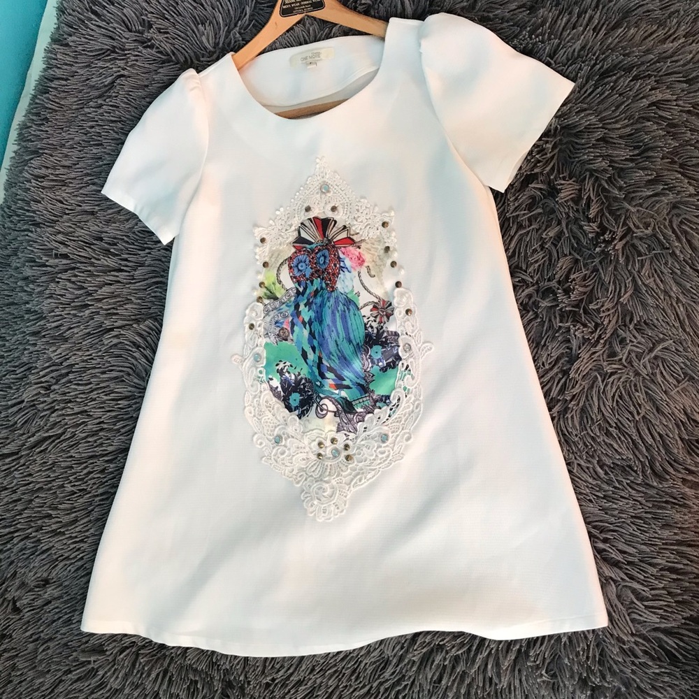 Retro girly style mini dress.  Size small.
